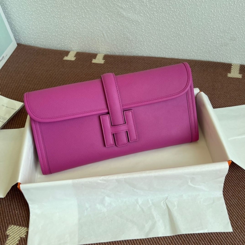 H**mes clutch bags